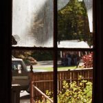 Street view from cracked window glass