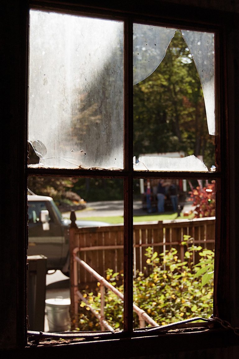 Street view from cracked window glass