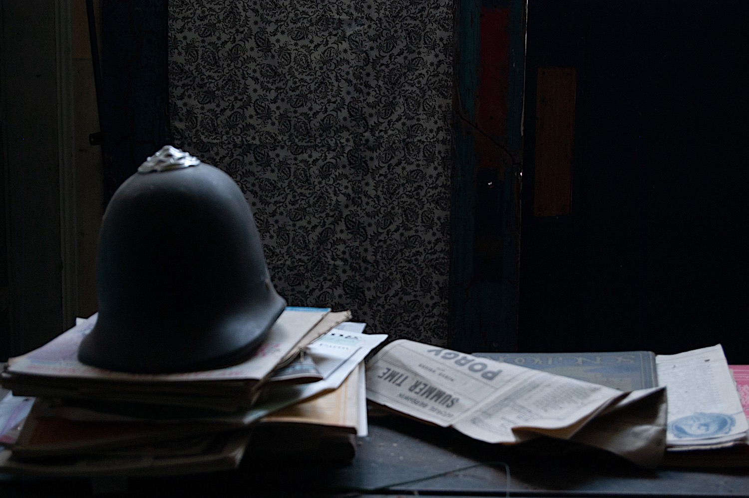 Old newspapers and helmet